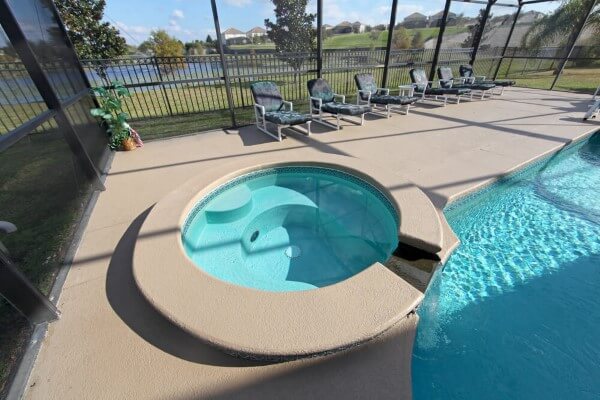 Custom-hot-tub-attached-to-swimming-pool