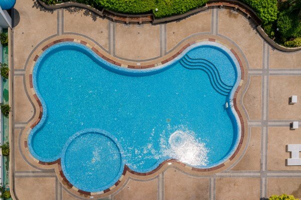Top-view-of-a-beautiful-circular-shaped-inground-swimming-pools